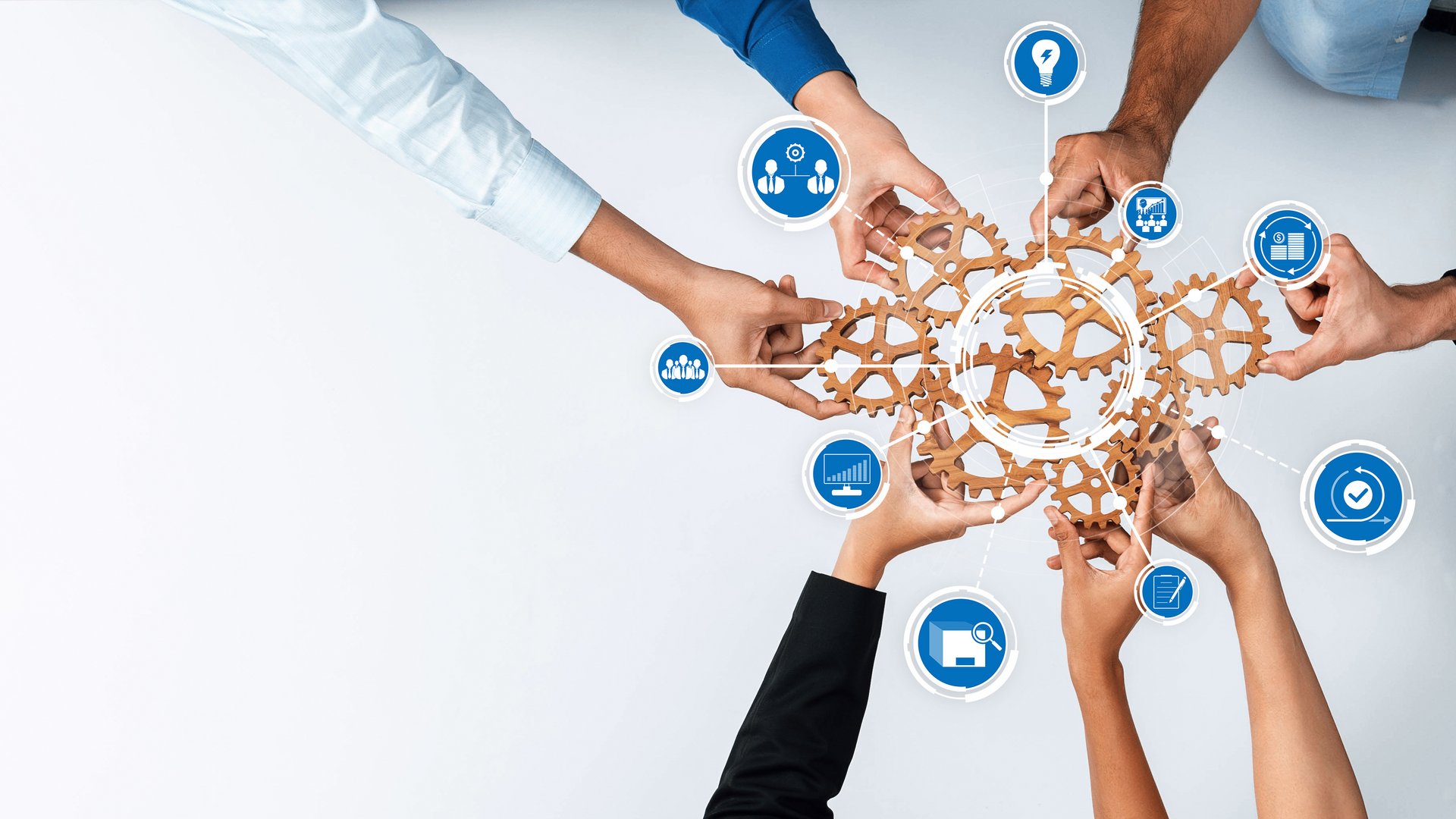 Collaborative Teamwork on a Project with Hands and Innovative Symbols Representing Ideas and Concepts Over a Clean White Surface. Amity